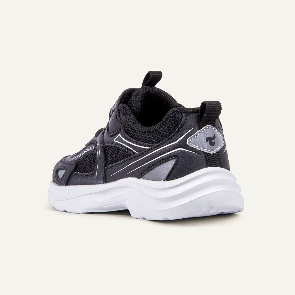 Play Infant in black from the inner side, mesh upper and white sole visible.