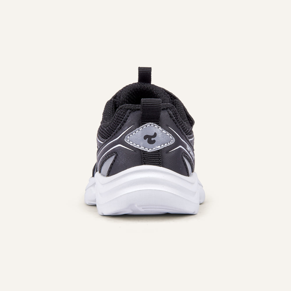 Play Infant in black, rear view with the Tiny Dancers logo on the heel.
