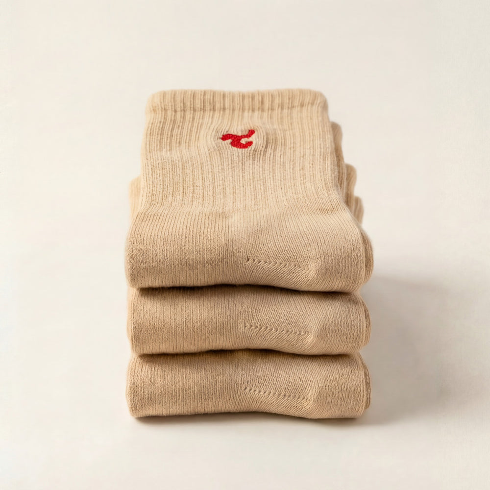 Tiny Socks 3-pack in Sugar Swizzle, three pairs folded and stacked.