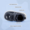 Play Infant in navy from above, labelled: foot-shaped toe box, flexible level soles, cuttable velcro, elastic laces, rubber mudguard.