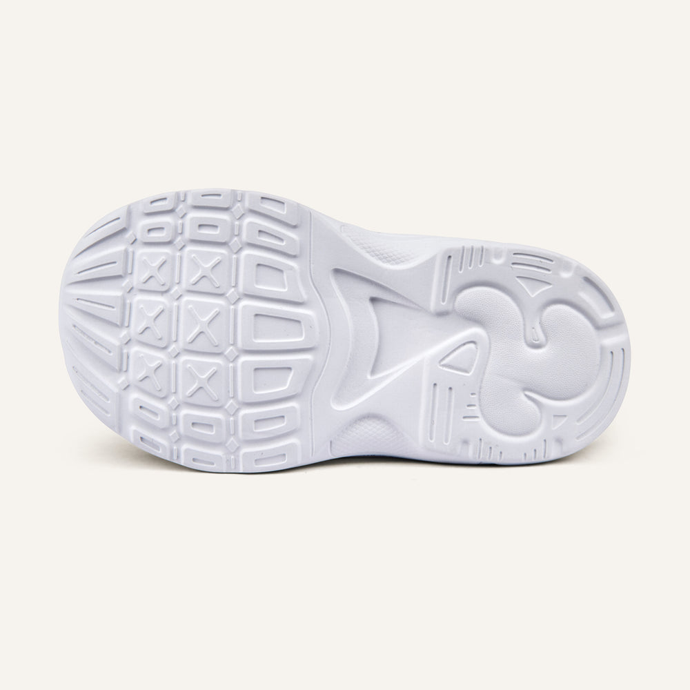 Play Infant outsole in white, showing the level tread pattern.