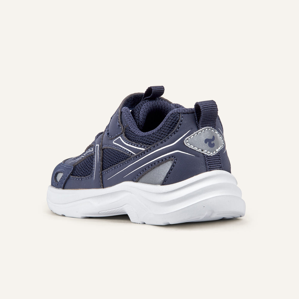Play Infant in navy from the inner side, mesh upper and white sole visible.