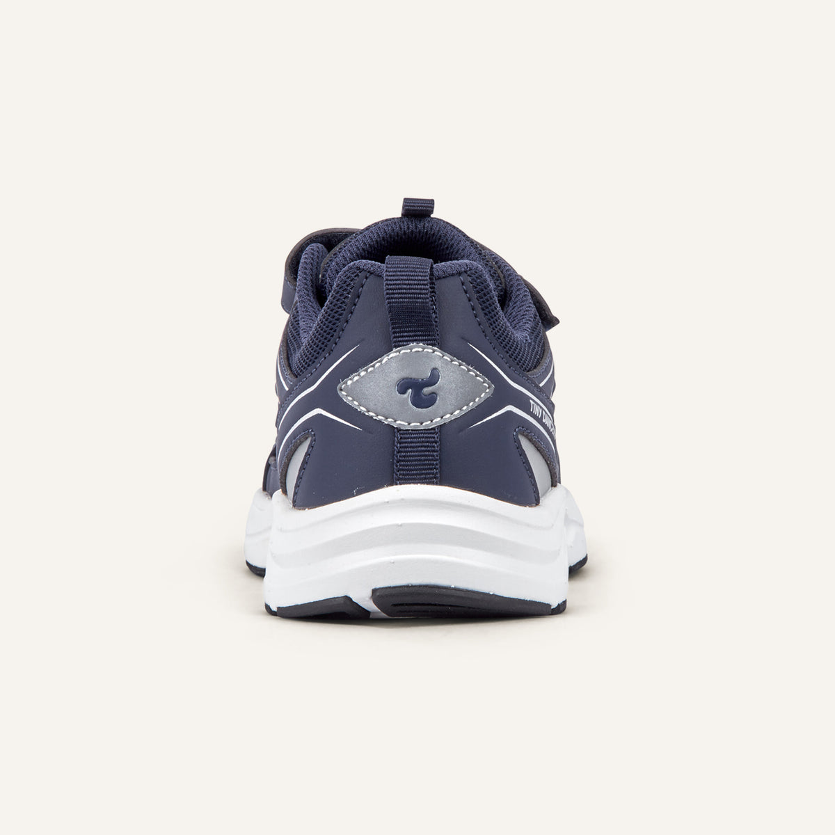 Play Junior in navy, rear view with the Tiny Dancers logo on the heel.